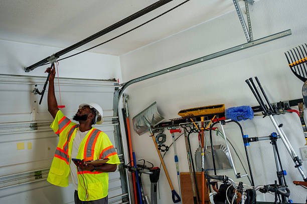 Professional Garage Door technician working in Munster, IN